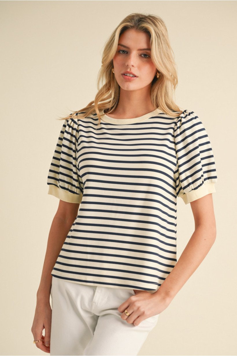 Casual cream and navy striped top with puff sleeves, perfect for coastal boutique clothing and summer outfits.