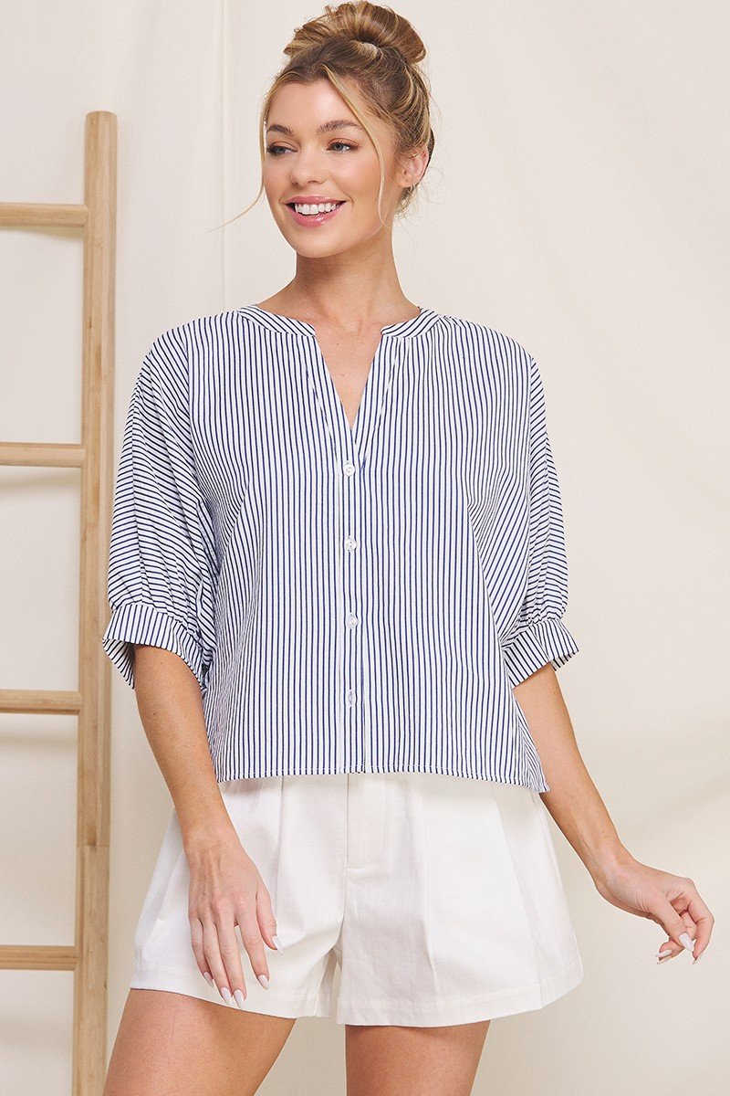 Navy pinstripe seersucker blouse with button front and dolman sleeves, perfect for coastal boutique clothing.