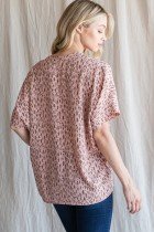 Back view of MAUVE V-NECK BOXY TOP showcasing trendy coastal style at Raggdoll Boutique.