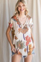 CREAM/BLACK FLORAL PRINT SHORT SLEEVE at Raggdoll Boutique, perfect for coastal fashion and summer outfits.