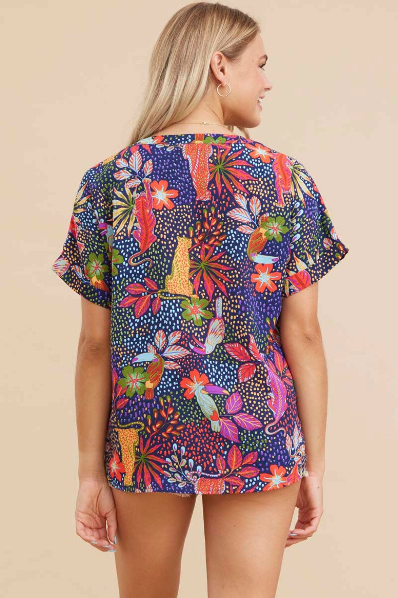 Colorful multi-print top, stylish and lightweight, perfect for coastal boutique clothing and tropical vacation dresses.