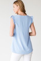 Back view of a SKY BLUE TOP with ruffle shoulders, perfect for summer outfits Texas at Raggdoll Boutique.