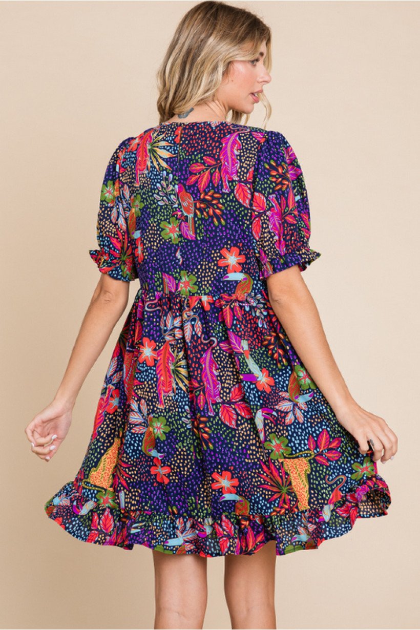 Laura Bell Dress from Raggdoll Boutique, featuring colorful floral pattern for trendy coastal style.