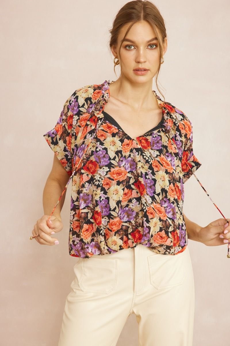 BROWN AND PINK FLORAL TOP WITH WAIST DETAIL featured in a stylish model, perfect for summer outfits Texas from Raggdoll Boutique.