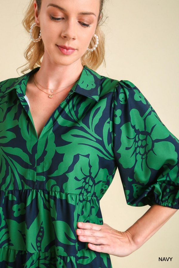 Close-up of a model wearing the TIMELESS NAVY AND GREEN DRESS from Raggdoll Boutique, showcasing trendy coastal style.