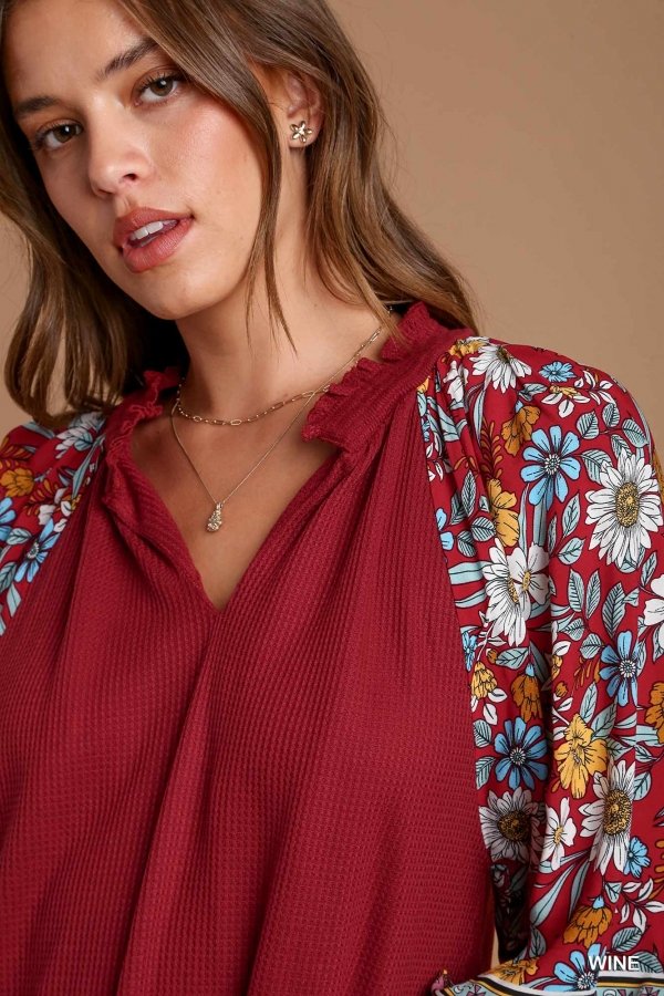 WINE AND FLORALS TOP featuring floral sleeves, perfect for summer outfits Texas from Raggdoll Boutique.