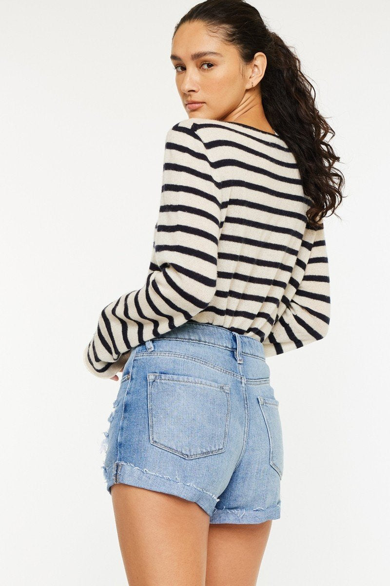 Mandy Shorts in light wash denim, featuring a cuffed hem and distressed detail, perfect for coastal boutique clothing.