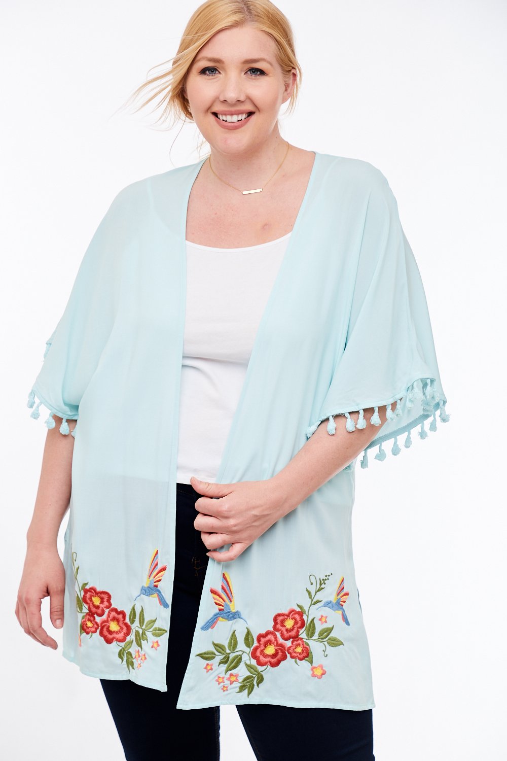 MINT EMBROIDERED KIMONO featuring tasseled sleeves and floral embroidery, perfect for coastal fashion at Raggdoll Boutique.