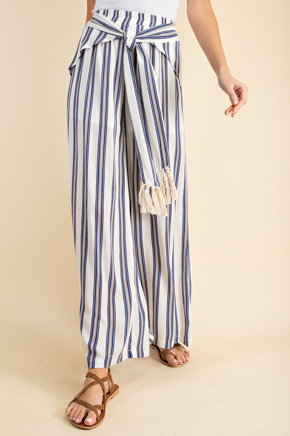 WHITE, BLUE KHAKI STRIPE TIE-FRONT PANTS from Raggdoll Boutique for trendy coastal style and summer outfits.