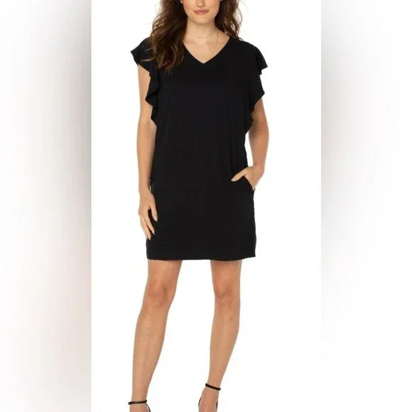 Liverpool Flutter Sleeve Black Dress from Raggdoll Boutique showcasing trendy coastal style perfect for vacation wardrobe.