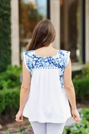 THE MARLA TOP in white and blue, perfect for summer outfits Texas from Raggdoll Boutique, your coastal fashion boutique.