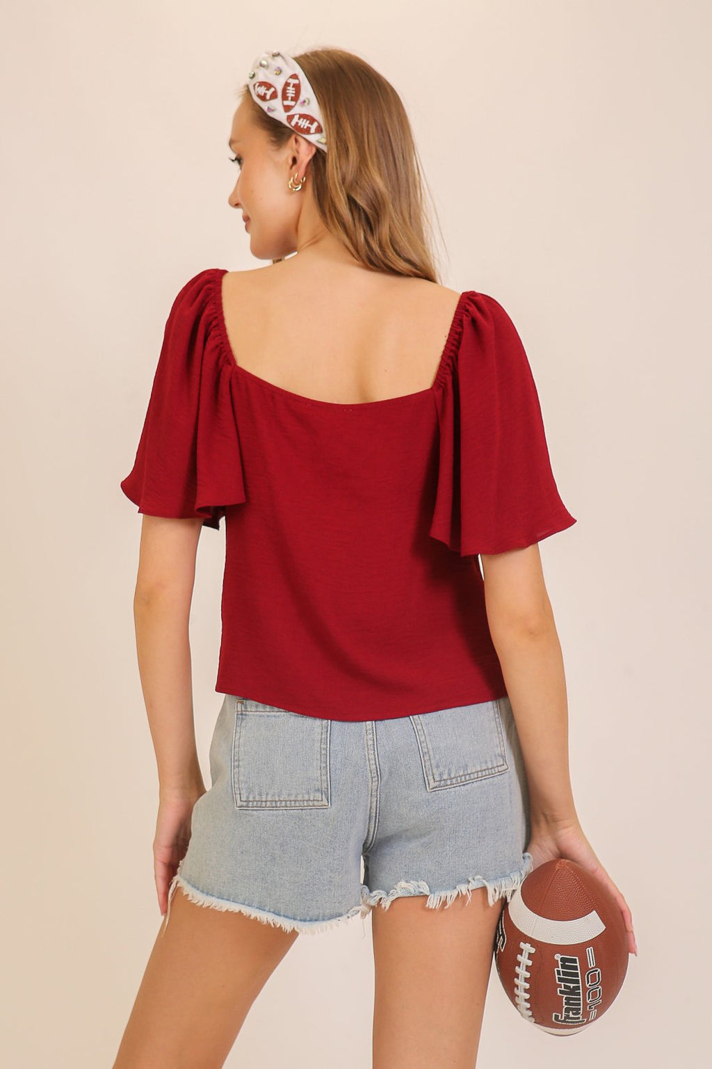 Maroon Game Day Top, perfect for coastal boutique clothing and stylish tops for women, ideal for Port Aransas outings.