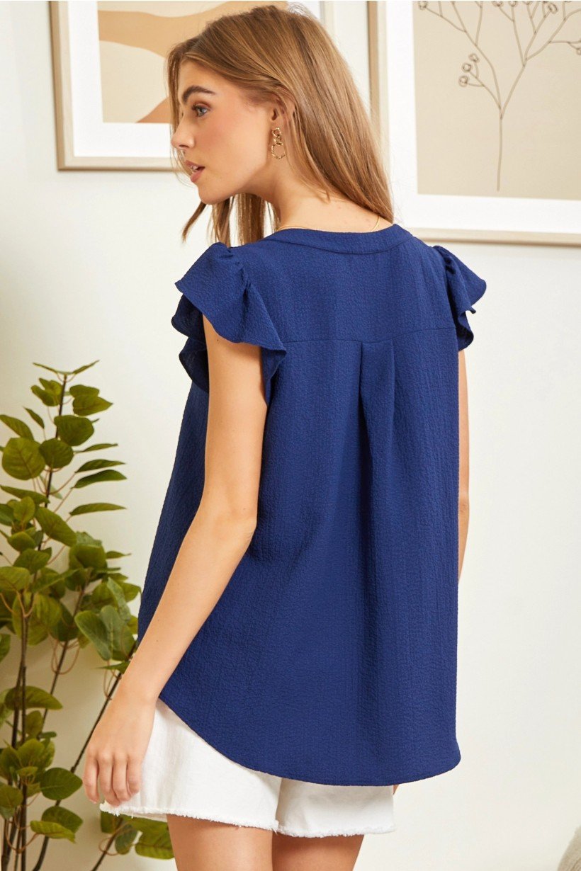 Navy Top from Raggdoll Boutique, showcasing trendy coastal style and perfect for summer outfits Texas.