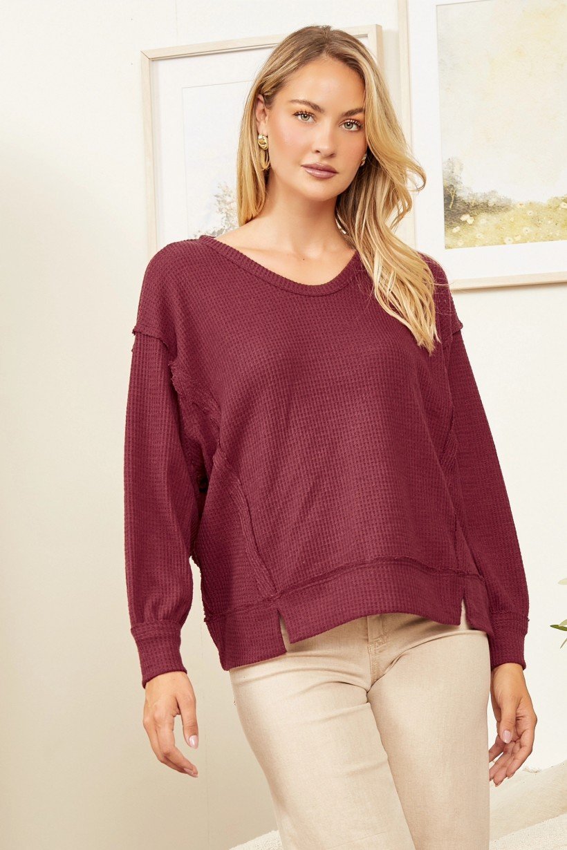 Wine Thermal Loose Fit Top modeled, perfect for coastal fashion at Raggdoll Boutique in Port Aransas.