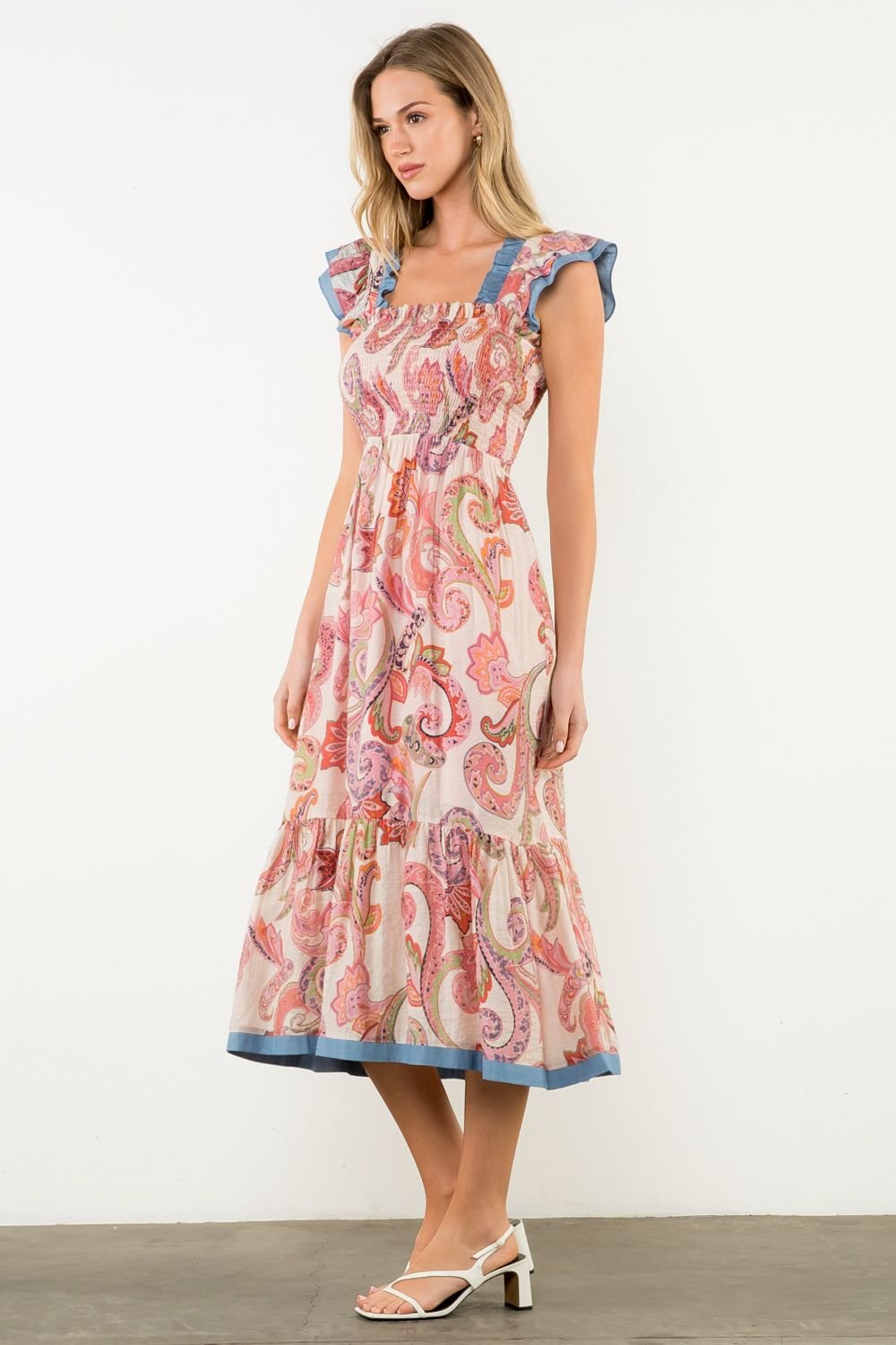 Molly Dress featuring a colorful paisley design, perfect for coastal boutique clothing and tropical vacation dresses.