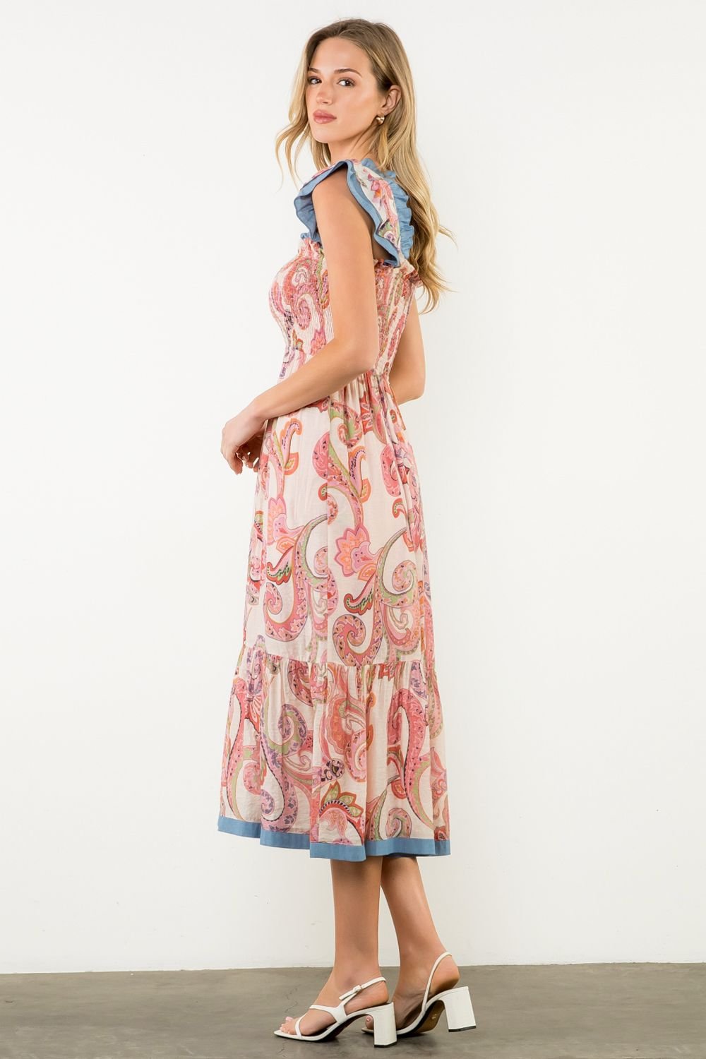 Molly Dress, a stylish beach dress from Port Aransas boutique, featuring a paisley print, perfect for tropical vacations.