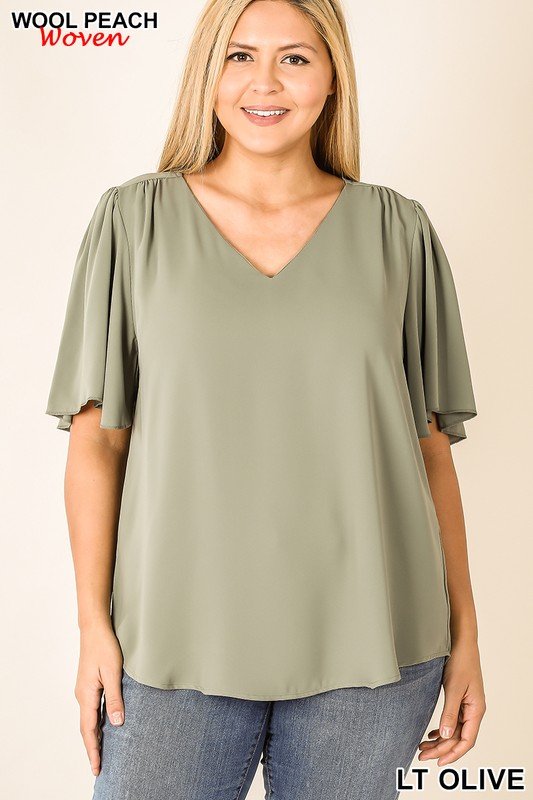 Plus light olive woven wool peach top for curvy women. Stylish V-neck and waterfall sleeves, perfect for Port Aransas boutique.