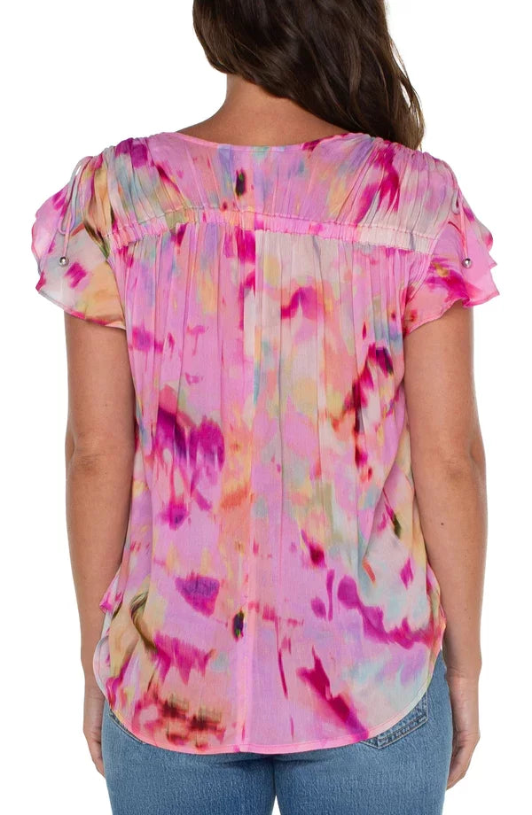 LIVERPOOL FUSHIA WATERCOLOR SHIRRED TOP back view featuring shirred details and vibrant watercolor pattern