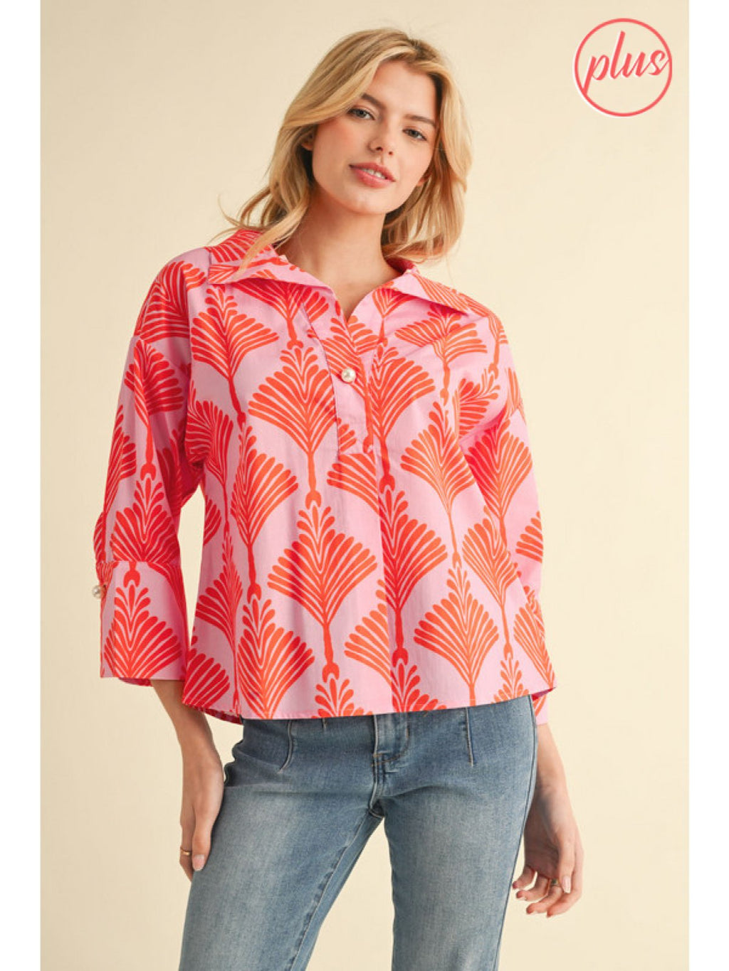 Plus size Darla Top in vibrant orange print, breathable cotton blouse with pearl button closure and stylish wide collar.