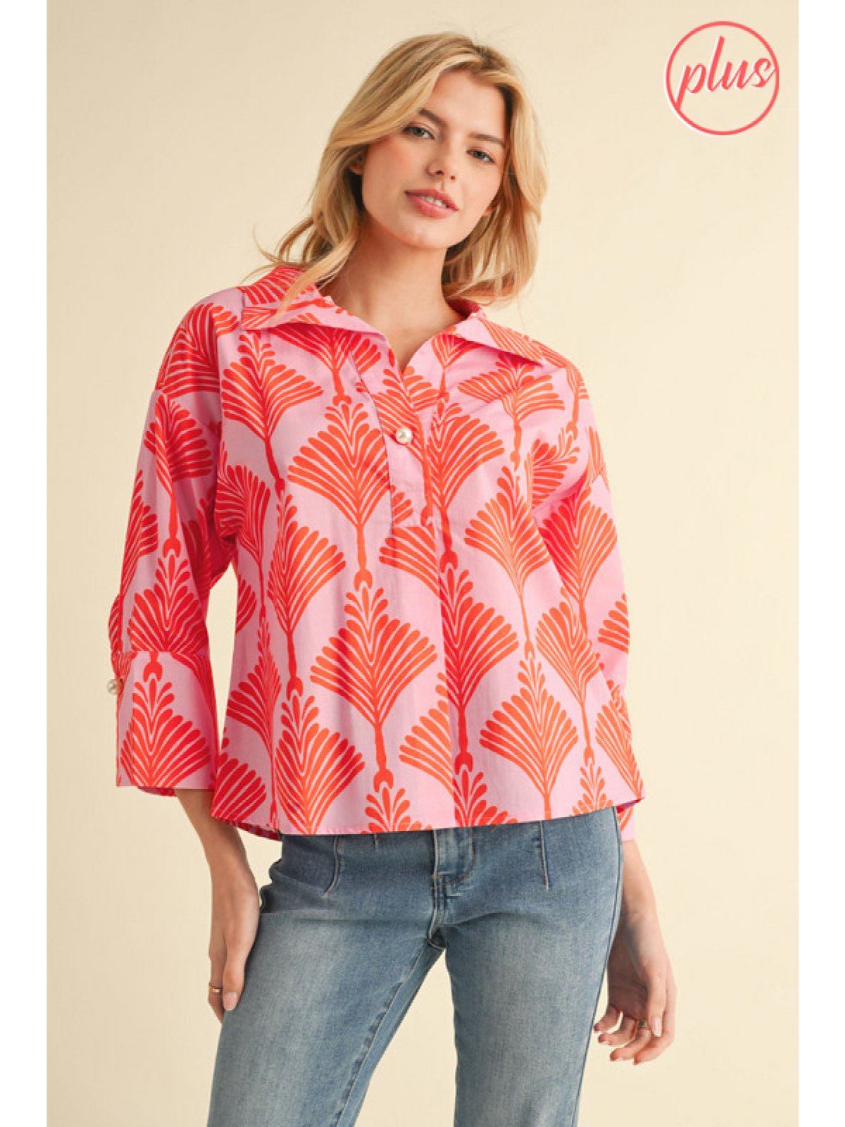 Plus size Darla Top in vibrant orange print, breathable cotton blouse with pearl button closure and stylish wide collar.