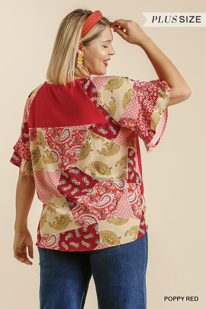 Wearing the POPPY TOP PLUS in a stylish red paisley print from Raggdoll Boutique, perfect for coastal fashion.