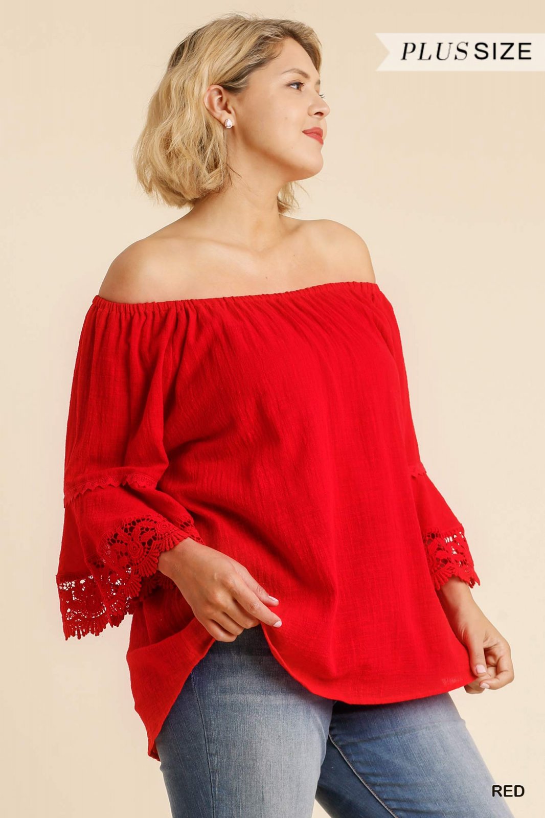 Stylish red off-shoulder lace trimmed top for curvy women, perfect for coastal boutique clothing and tropical vacations.