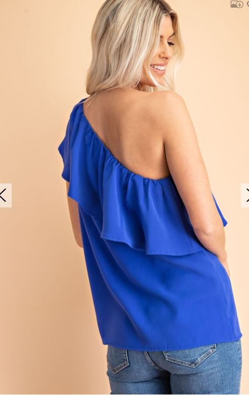 ROYAL ONE SHOULDER RUFFLE TOP in vibrant blue, perfect for trendy coastal style. From Raggdoll Boutique, Port Aransas.