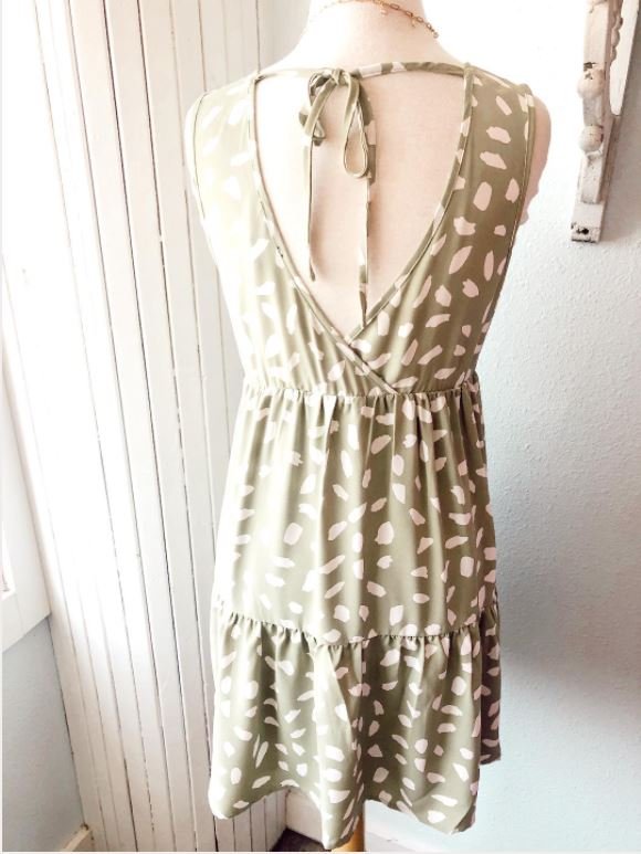 SAGE AND WHITE PRINT DRESS WITH BACK DETAIL showcased on a mannequin, perfect for summer outfits Texas.