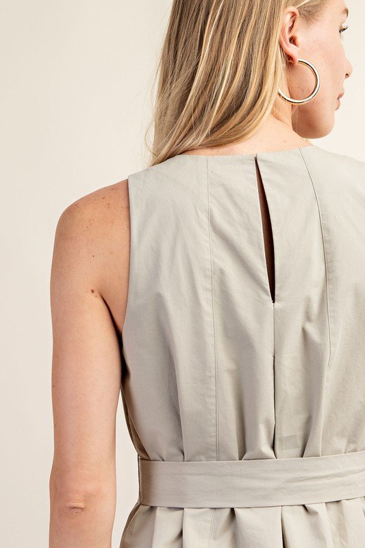 Back view of the light khaki Blake dress, perfect for summer, available at a coastal boutique clothing in Port Aransas.