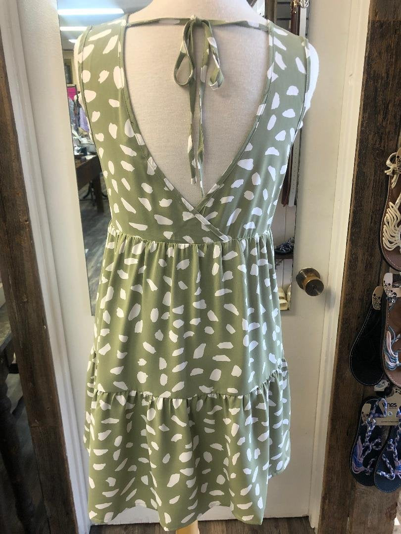 BACK VIEW OF PERFECTLY PLAYFUL SAGE AND WHITE DRESS FROM RAGGDOLL BOUTIQUE