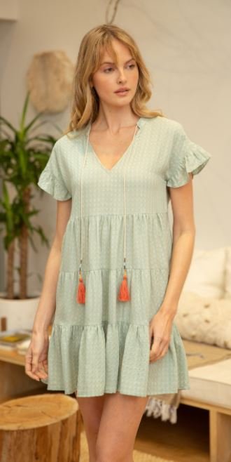 SAGE DRESS WITH TASSELS from Raggdoll Boutique featuring a baby doll style and beautiful tassel tie.