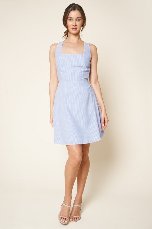 BLUE AND WHITE SEESUCKER OPEN BACK DRESS - Trendy coastal style from Raggdoll Boutique, perfect for summer outfits Texas.