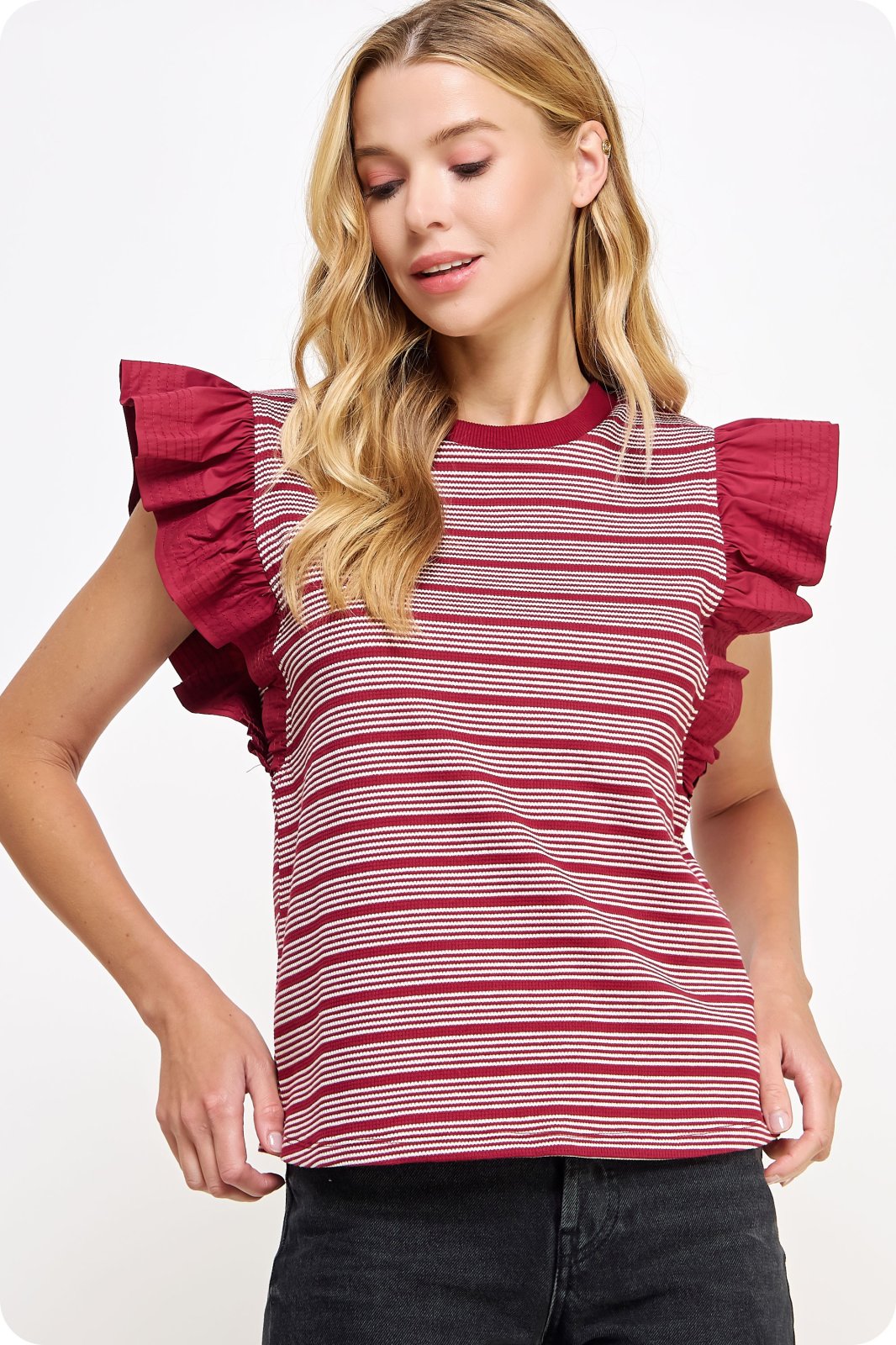 Jodi Top from Raggdoll Boutique, showcasing trendy coastal style with ruffled sleeves, perfect for summer outfits Texas.