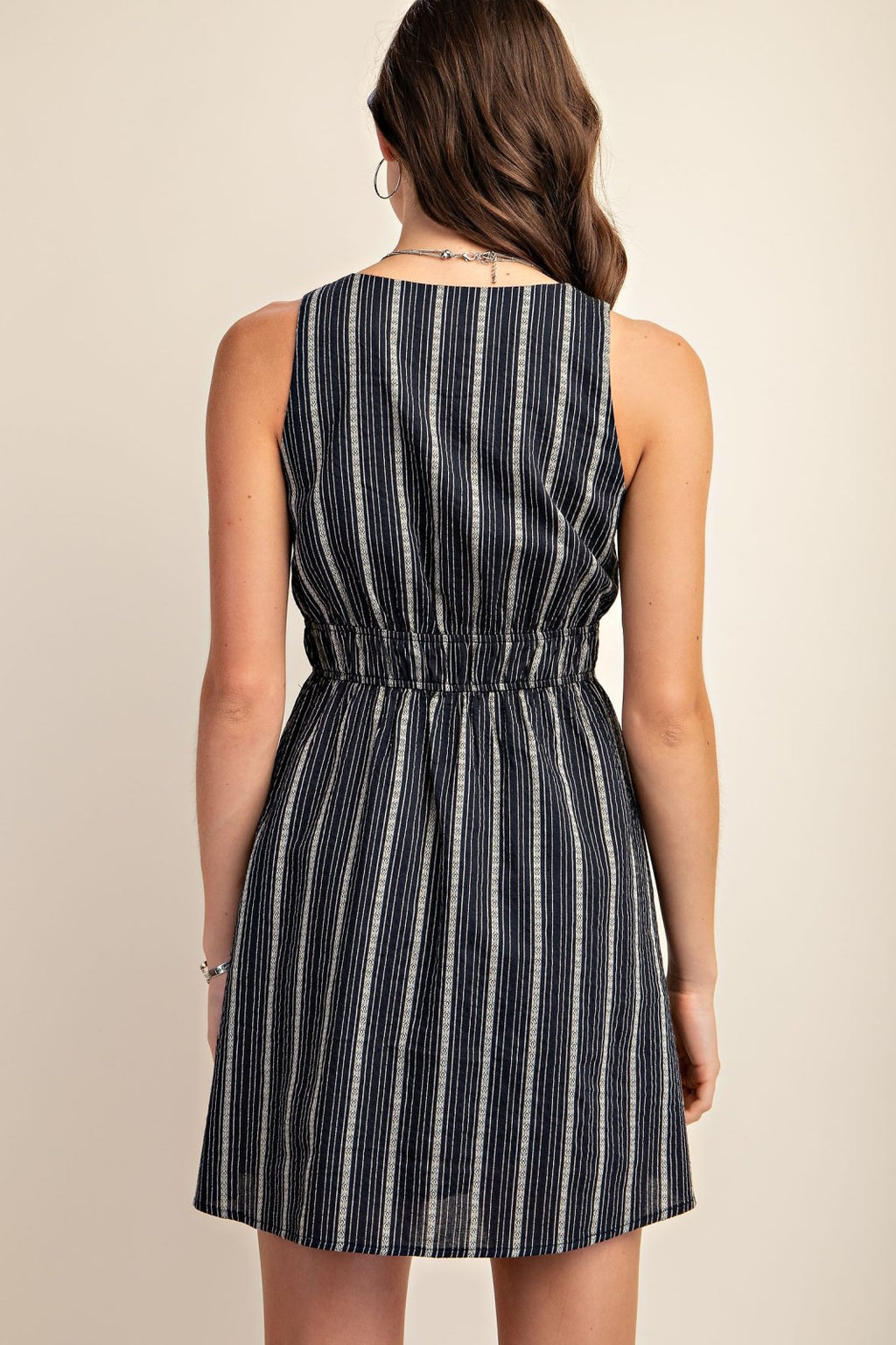 Contemporary striped Jordan dress perfect for coastal boutique clothing or tropical vacation dresses. Fully lined and stylish.