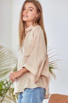Trendy coastal style with CHAMPAGNE BUTTON-UP TOP from Raggdoll Boutique, ideal for summer outfits Texas and vacation wardrobe boutique.