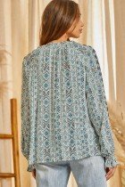 Back view of the FUN PRINT TUNIC TOP from Raggdoll Boutique, featuring trendy coastal style and ideal for summer outfits Texas.