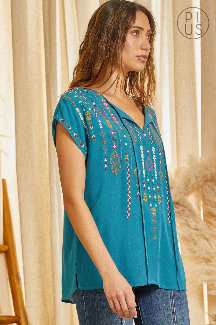 PLUS TEAL EMBROIDERED SAVANNA JANE TOP displayed on model, showcasing trendy coastal style and boutique fashion from Raggdoll Boutique.