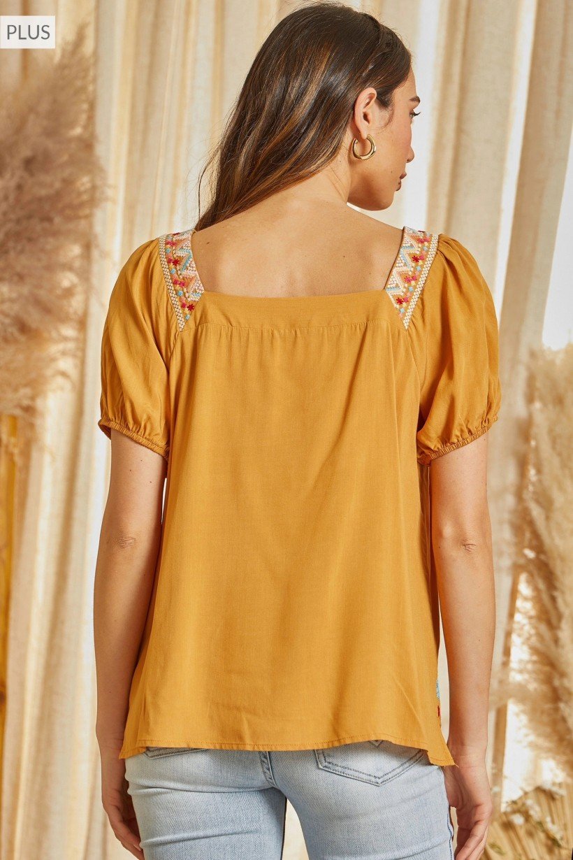 Savanna Jane Marigold Embroidered Top at Raggdoll Boutique showcasing trendy coastal style.
