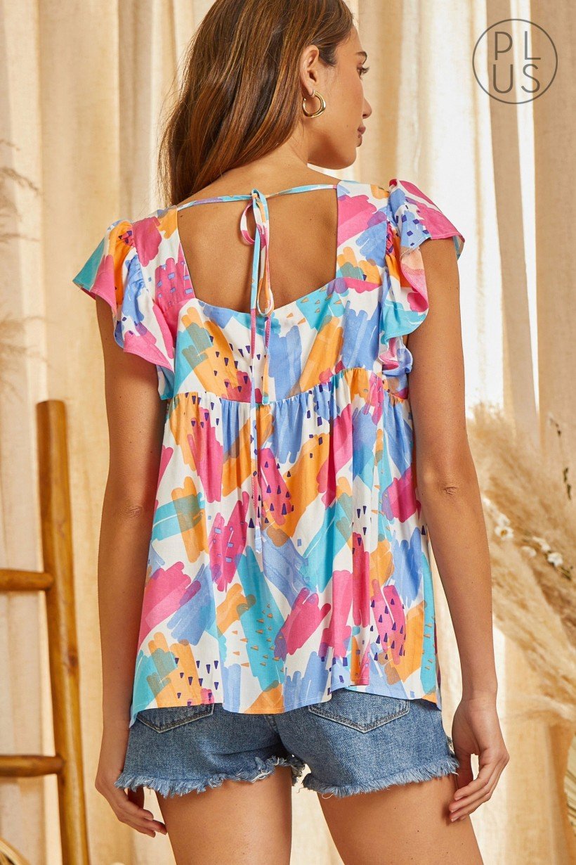 PLUS BRIGHT FLORAL WITH BOW BACK DETAIL TOP in vibrant colors, perfect for summer outfits at Raggdoll Boutique.