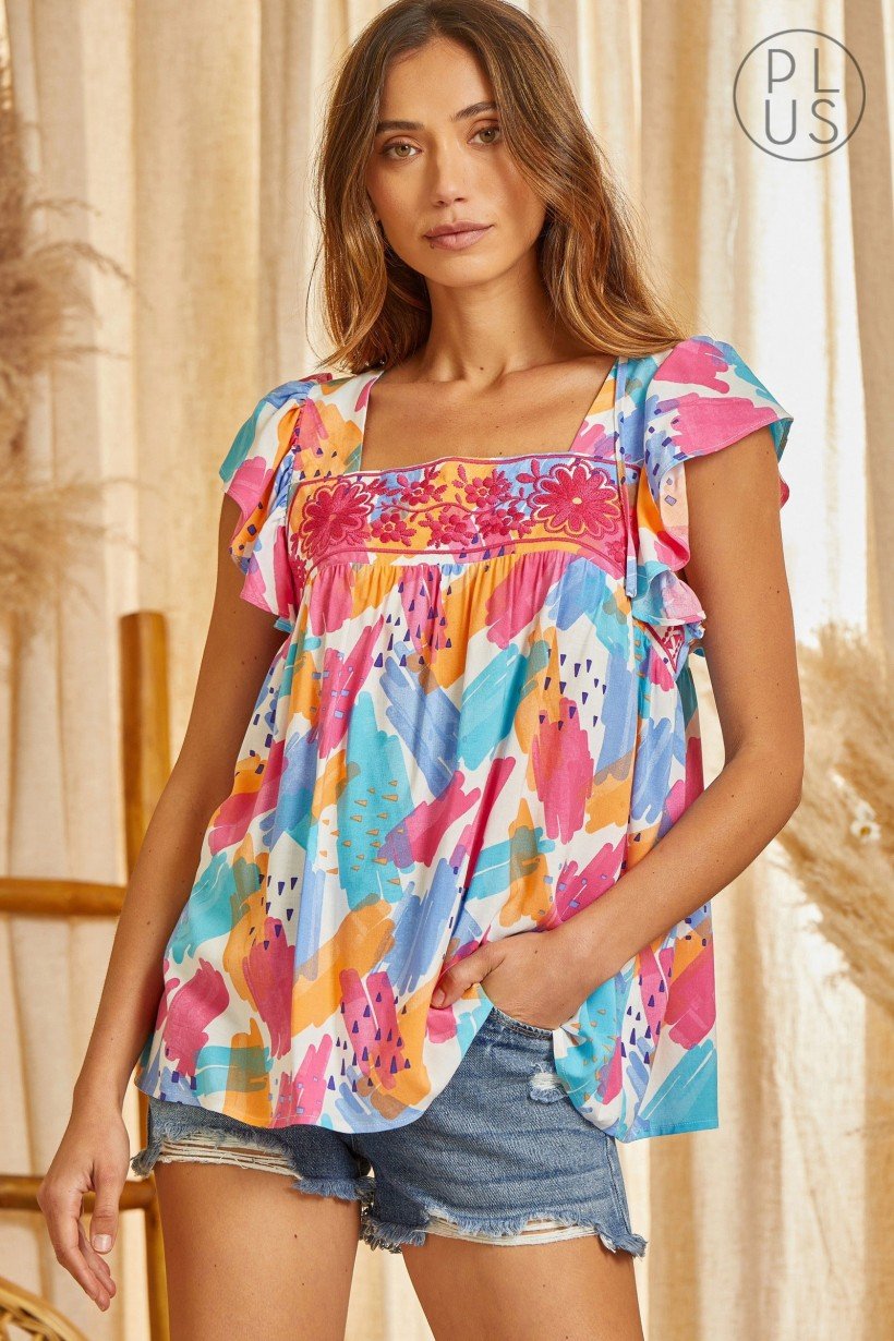 PLUS BRIGHT FLORAL WITH BOW BACK DETAIL TOP from Raggdoll Boutique, trendy coastal style women’s clothing.