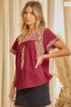 PLUS SAVANNA JANE WINE AND TAUPE TOP displayed on a model with coastal style, ideal for summer outfits Texas.
