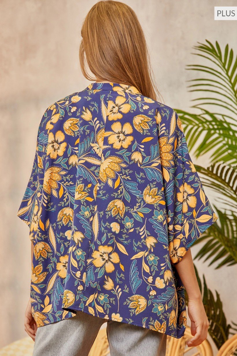 Back view of ROYAL PLUS EMILY WONDER TOP from Raggdoll Boutique, showcasing trendy coastal style and floral design.