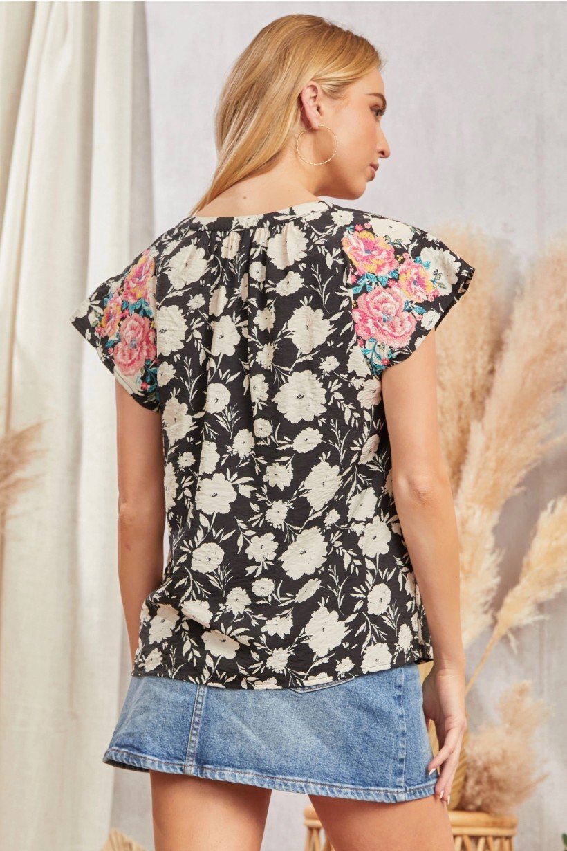 Savanna Jane Top with Embroidery featuring floral design, perfect for trendy coastal style at Raggdoll Boutique.