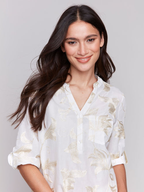 Stylish White/Gold Embroidered Top for women, perfect for coastal boutique clothing and tropical vacation outfits.