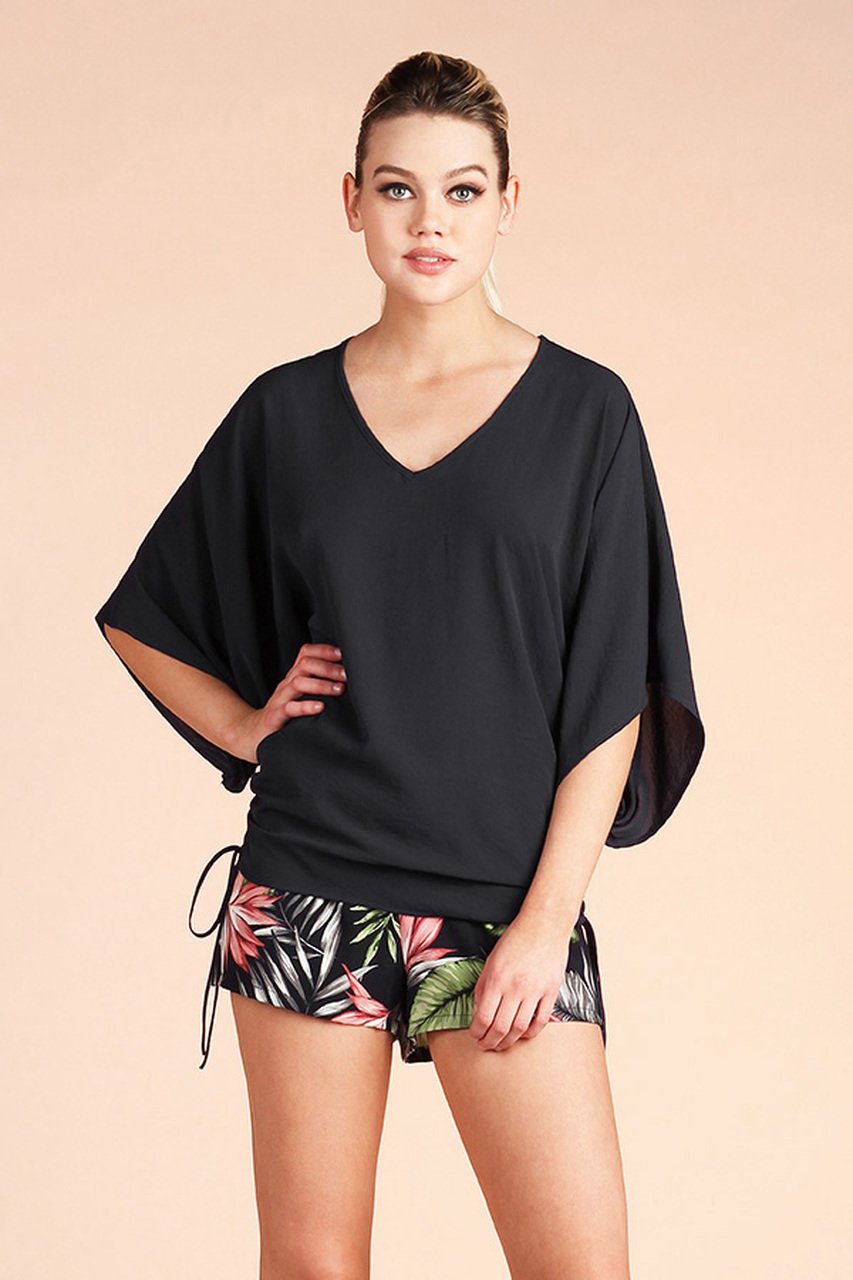 FAVORITE BLACK TOP WITH SIDE RUCHING paired with trendy shorts, featured at Raggdoll Boutique for coastal fashion.