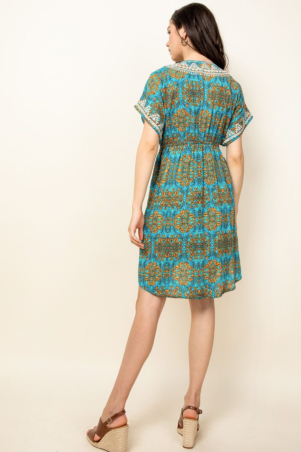 Back view of ALL IN THE DETAILS DRESS from Raggdoll Boutique, perfect for summer outfits in Port Aransas.