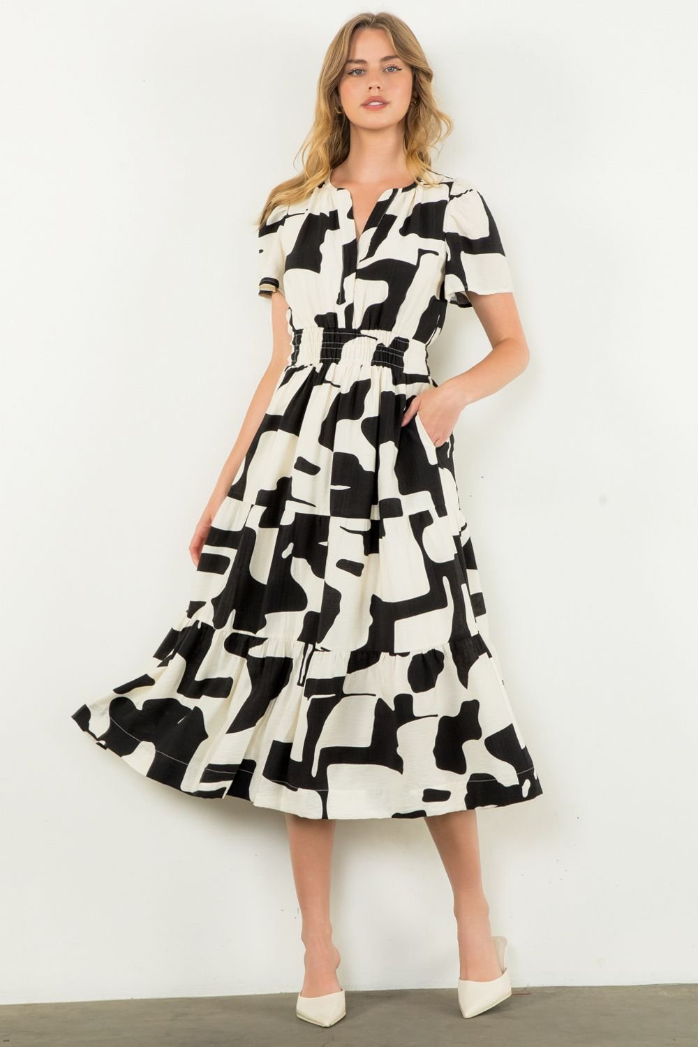 Stylish THML Joss Dress, perfect for coastal boutique clothing and tropical vacations. Ideal addition to curvy women's fashion.