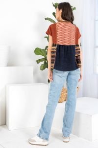 Stylish mixed print knit top from a Port Aransas boutique, perfect for curvy plus size fashion and coastal vacations.