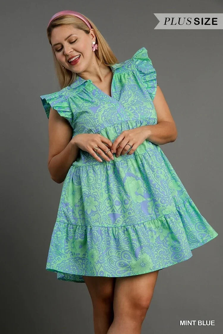 Plus size mint blue dress with ruffled cap sleeves, perfect for coastal boutique clothing and tropical vacations.