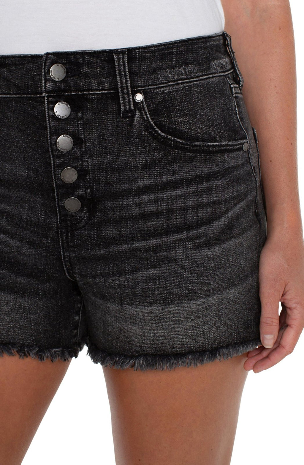 Liverpool Distressed Black Denim Short showcasing trendy coastal style from Raggdoll Boutique.